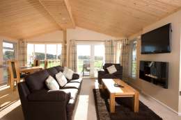 42 inch flat screen TVs installed in each lodge - Click for larger version